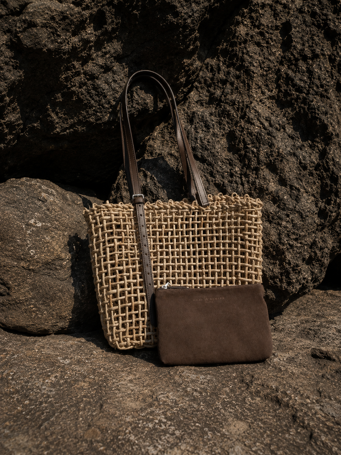 Woven raffia tote bag with leather pouch