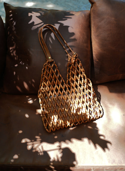 Supple beaded tote bag